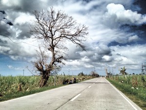 THE ROAD. A long lonely stretch up northern Cebu, post-Yolanda.