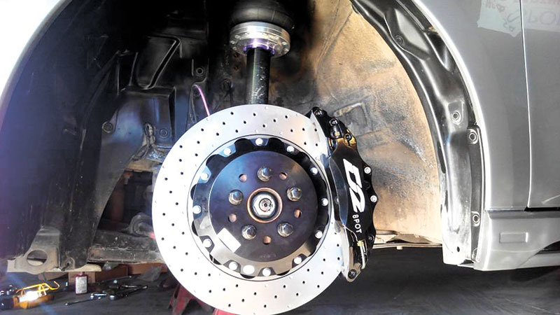 BIG BRAKES. Bigger brakes bring back the stopping power lost after installing larger wheels. Notice the airbag suspension: ride height can be altered with the push of a button.