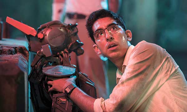 Dev Patel in a scene from “Chappie.” (AP FOTO)