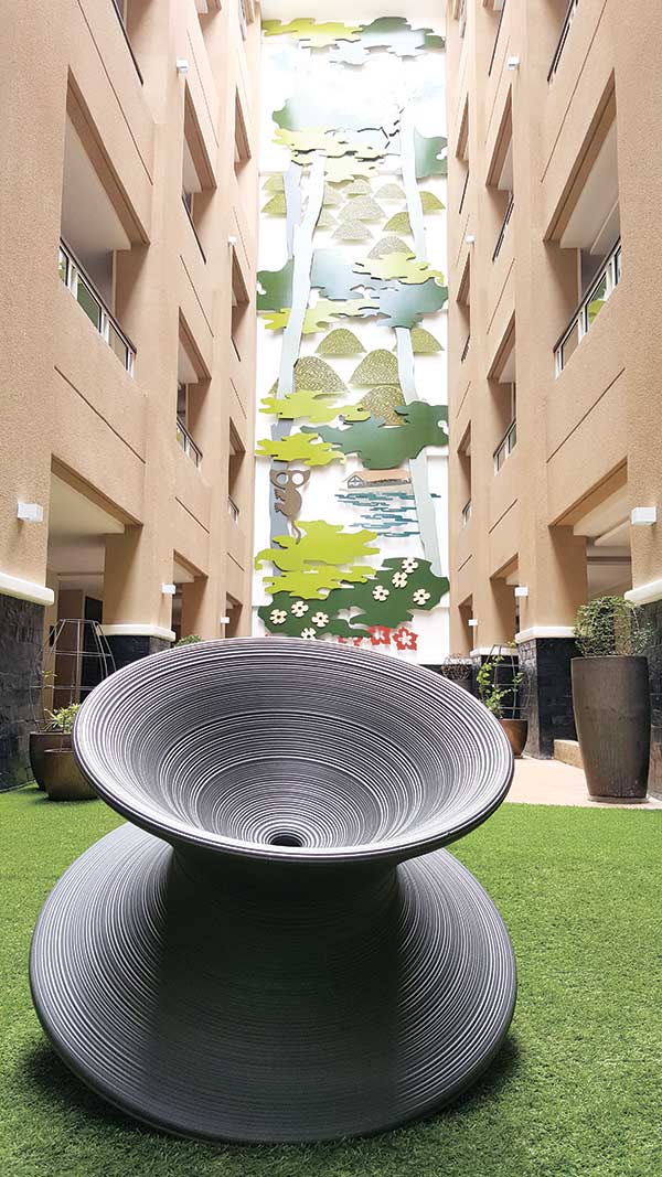 One of two must-see vertical murals at Be Grand Resort