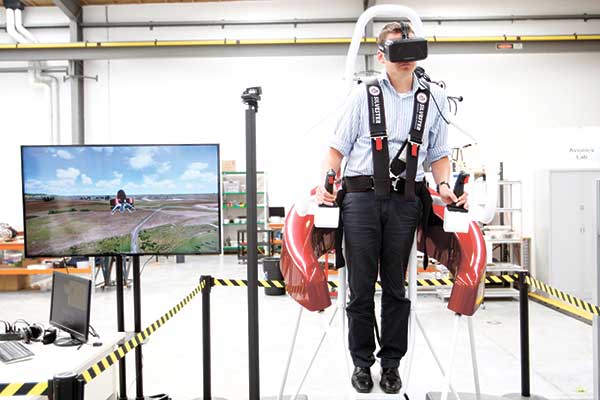 READY TO FLY? Test pilot Michael van der Vliet operates a flight simulator at the Martin Aircraft Co. headquarters in Christchurch, New Zealand. (AP PHOTO)